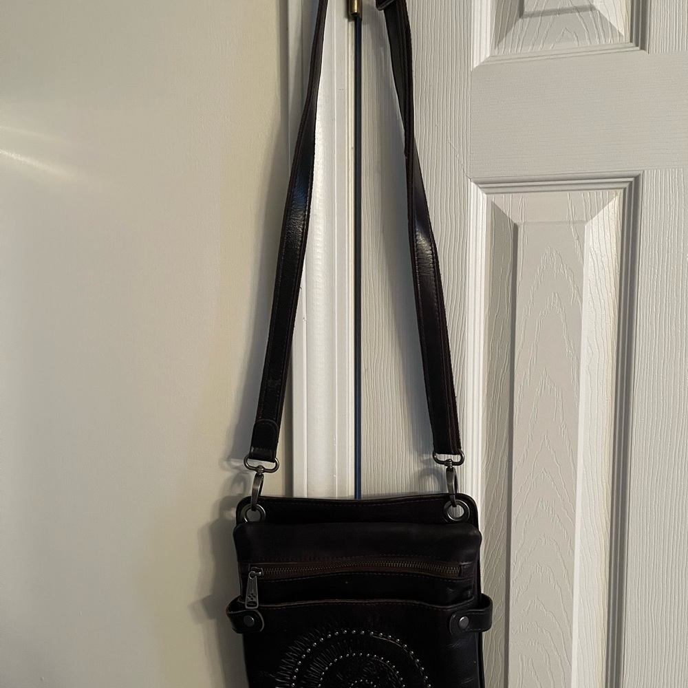 Beautiful brown Patricia Nash Francesca crossbody purse.